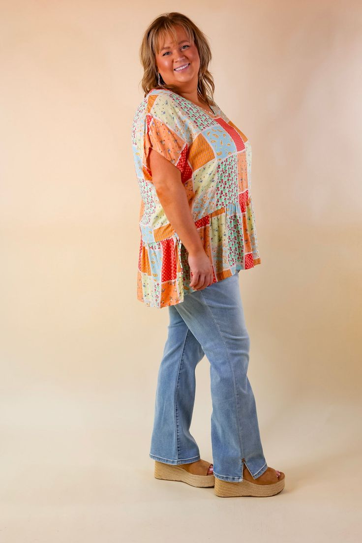 This Divine Downtime peplum top features an oversized fit with short drop sleeves, a flattering v-neckline, and a peplum hem. It comes in an eye-catching mix patch print featuring vibrant floral and paisley accents in shades of orange, green, and blue. Make a bold statement any day of the week with this stylish and comfortable piece. Pair it with Judy Blue Jeans and sandals for a Spring season look! Model: Kristen is wearing a size small. Maci is wearing a size 2XL. Size Measurements: Small: Bus Floral Print Short Sleeve Peplum Top For Spring, Summer Floral Print Peplum Top With Short Sleeves, Summer Short Sleeve Peplum Top With Floral Print, Multicolor Peplum Tops For Summer, Spring Short Sleeve Peplum Top, Casual Floral Print Peplum Top With Short Sleeves, Short Sleeve Blouse With Floral Patchwork For Spring, Casual Multicolor Blouse With Floral Patchwork, Spring Mixed Print Short Sleeve Tops