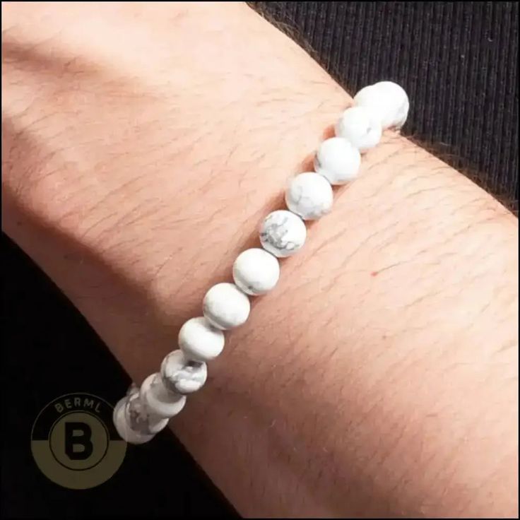 The Kincaid is a sleek statement piece that cuts through the noise. This cool, sharp white howlite isn’t flashy, but it packs a punch. It's like strapping on a shot of confidence, ready to tackle whatever life throws your way. Gear up and conquer! Specifications: Material: RockFinish: Polished Why do men's beaded bracelets never go out of style? Because they're the quintessential blend of fashion and ease. These bracelets are not just an accessory; they're an attitude. Our collection of gemstone- and bead bracelets for men takes this vibe to the next level. From casual cool to formal finesse, these bracelets are your go-to for an instant style upgrade. White Hypoallergenic Minimalist Bracelet, Modern White Bracelets With Round Beads, Modern White Round Beads Bracelets, Modern White Round Bead Bracelets, Minimalist White Beaded Bracelets For Everyday, White Modern Beaded Bracelets, Modern White Beaded Bracelets, Modern White Round Beaded Bracelets, Modern White Adjustable Bracelets