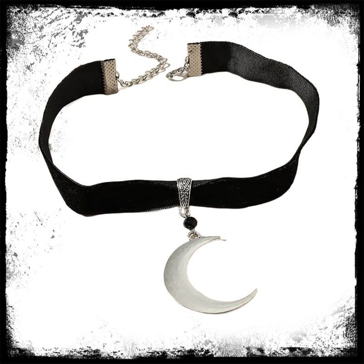 Velvet style choker with large silver style crescent moon. Choker 12+3 inches, pendant 1.7 inches Zinc Alloy silver plated Alternative Metal Choker For Halloween, Alternative Style Silver Choker For Festivals, Alternative Halloween Choker Jewelry, Black Metal Moon Shaped Jewelry, Alternative Silver Choker Necklace, Black Metal Moon-shaped Jewelry, Alternative Festival Choker Jewelry, Silver Moon-shaped Halloween Jewelry, Black Moon Charm Jewelry For Party