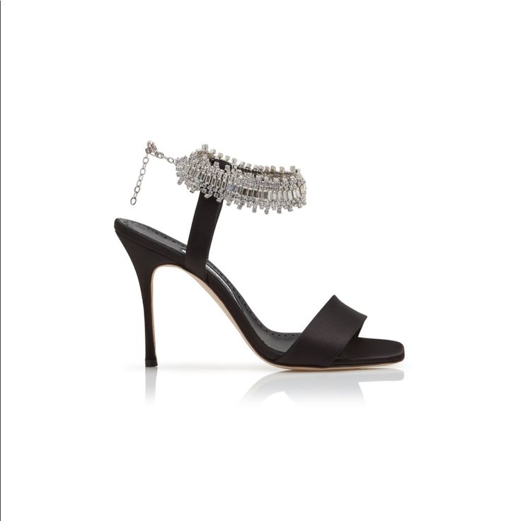 Black Satin Square Toe Sandals Featuring A Crystal Embellished Ankle Strap With An Adjustable Clasp And Stiletto High Heel. Upper: 72% Viscose, 28% Silk. Sole: 100% Cow Leather. Lining: 100% Goat Skin. Heel Measures 105 Mm. Italian Sizing. Made In Italy. This Item Runs True To Size. We Recommend Ordering Your Regular Shoe Size. Most Items Come From A Retail Store And May Have Been Tried On. They Can Occasionally Have Some Light Marks Or Stickers/Sticker Residue On The Outsoles. Color May Appear Elegant Embellished Ankle Strap Sandals, Designer Embellished Sandals For Gala, Chic Silver Embellished Sandals, Designer Embellished Silver Sandals, Designer Silver Embellished Sandals, Hand Embellished Heels For Evening, Hand Embellished Heels For Party, Silver Embellished Sandals For Formal Occasions, Formal Silver Embellished Sandals