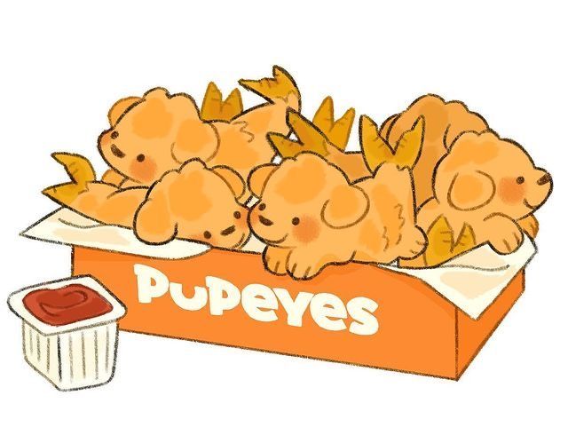 an orange box filled with puppies next to a container of ketchup