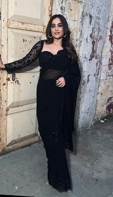 #FashionOutfit #OutfitInspo #OOTD #FashionStyle #OutfitOfTheDay #FashionGoals #StreetStyle #StyleInspo #Fashionista #TrendyOutfit #FashionAddict #ChicOutfit #StyleVibes #FashionLovers #CasualOutfit #Lookbook #OutfitIdeas #FashionForward #EverydayFashion #FashionTrends #StyledByMe Black Fancy Blouse Designs, Black Saree For Reception Party Wear, Full Sleeved Blouses Saree, Farewell Sarees Plus Size, Black Saare Look For Wedding, Black Saree Wedding Look, Black Saare For Farewell School, Farewell Black Saree, Freshers Party Outfit College Indian Saree