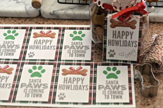 dog paw gift tags on a table with other items