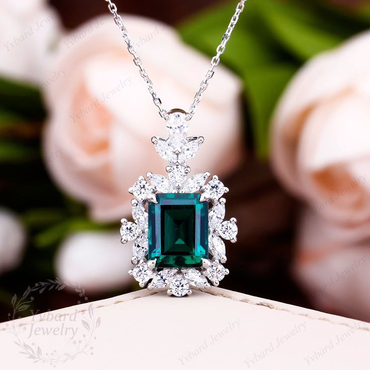 "Jewelry Details -Gold Type:  Solid 18K Gold / Solid 14K Gold  (Choose One in Material Option) -Center Stone: Lab Created Emerald 8*10mm, Approximately 3.24ct Color: Green--- 5A Clarity: VVS Cut: Emerald Cut / 3EX -Side Stone: 1.86cttw moissanite Color: EF Clarity: VVS1 Cut: Round Cut, Marquise Cut -Pendant Width: 15.6mm -Pendant Height: 25mm -Chain Length: 40+3+3cm SKU: YP0068 ~*-*~Purchase Guarantee: - All our jewelry is handmade, and each process is refined. - 14 Day Refund Guarantee. - All our products are Free Shipping. - Free Gift Box&Packing. ~*-*~Please contact us if you need service: 1. Ring Resizing. 2. Metal Change(PT950/10k/14k/18k White/Yellow/Rose Gold). 3. Engraving ring (less than 10 letter). 4. Accept customization. We believe that our quality, attention to detail, design Exquisite Brilliant Cut Emerald Necklace Gift, Exquisite Emerald Necklace For Anniversary, Emerald Jewelry In Diamond White For Anniversary, Anniversary Jewelry In Diamond White Emerald, Dazzling Emerald Necklace For Anniversary, White Gold Emerald Jewelry For Anniversary, Dazzling White Gold Emerald Necklace For Anniversary, White Gold Emerald Necklace For Anniversary, Fine Jewelry With Birthstone For Party