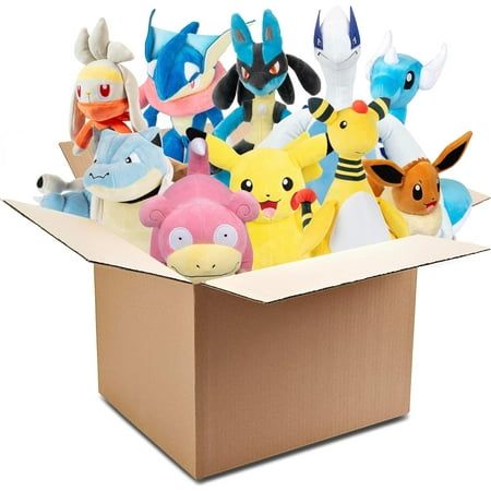 a cardboard box filled with pokemon stuffed animals