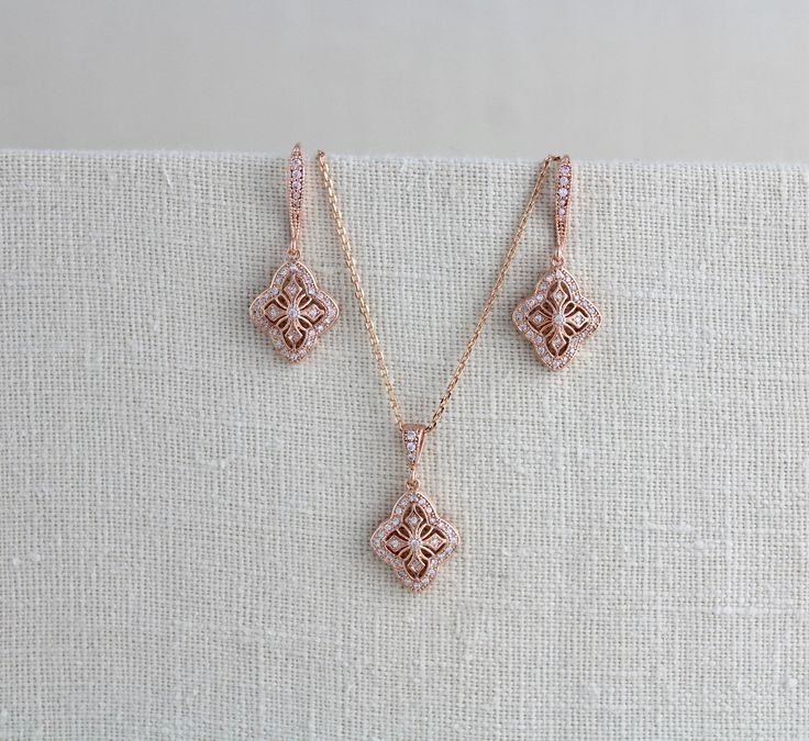 Dainty rose gold necklace created with lovely delicate components set with Swarovski Pure Brilliance cz stones - Handcrafted with Swarovski Pure Brilliance components. - All clear stones - Rhodium, yellow gold or rose gold finish - Necklace measures 16 inches and extends to 18 inches - Nickel free and hypoallergenic - PLEASE ALLOW APPROX 7 BUSINESS DAYS FOR COMPLETION BEFORE SHIPPING ** This listing is only for the necklace This is an original design by © Treasures by Agnes Matching pieces: http Delicate Pink Gold Pendant Jewelry, Gold Sterling Silver Jewelry Sets For Wedding, Dainty Rose Gold Jewelry With Elegant Design, Elegant Pink Gold Necklaces With Delicate Chain, Elegant Pink Gold Necklace With Delicate Chain, Dainty Rose Gold Wedding Jewelry, Delicate Rose Gold Wedding Jewelry, Elegant Pink Gold Jewelry With Adjustable Chain, Elegant Pink Gold Cubic Zirconia Necklaces