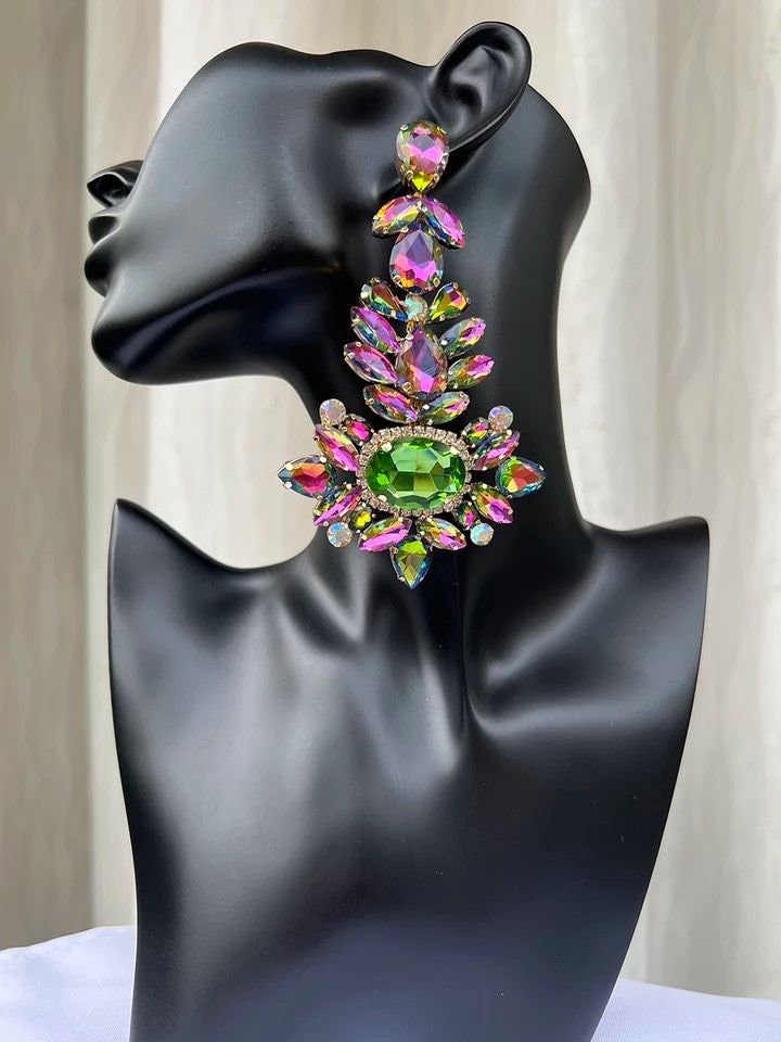 These earrings are definitely catchy and will take your outfit to the next level! They vibrant and popping are just what you need to dress up a casual look or add more pop to an already popping outfit. Comes in both fuchsia and green/pink combo. Trendy Crystal Earrings, Trendy Pink Evening Earrings, Glamorous Spring Party Earrings, Glamorous Party Earrings For Spring, Chic Spring Earrings For Party, Summer Party Dangle Crystal Earrings, Summer Party Crystal Dangle Earrings, Trendy Pink Jewelry For Evening, Trendy Pink Evening Jewelry