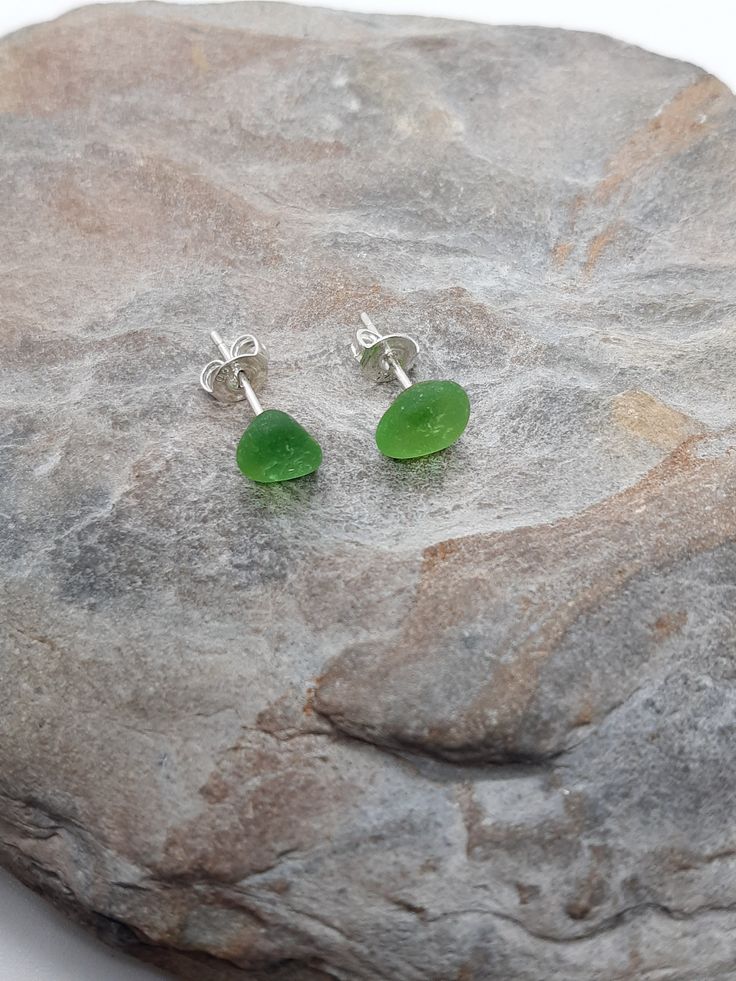 Green Lizard sea glass sterling silver stud earrings only 1 available  Found at The Lizard beach Green Sea Glass Jewelry, Silver Sea Glass Earrings For Gift, Silver Hypoallergenic Sea Glass Earrings, Silver Hypoallergenic Earrings With Sea Glass, Hypoallergenic Silver Sea Glass Earrings, Hypoallergenic Sea Glass Jewelry As A Gift, Hypoallergenic Sea Glass Jewelry For Gift, Round Sea Glass Jewelry Gift, Silver Sea Glass Earrings For Beach