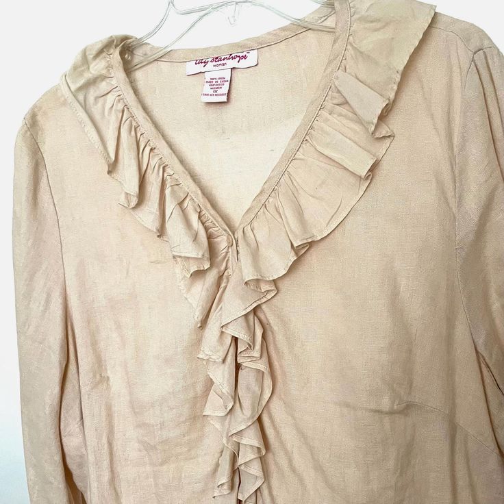 Linen Shirt 100% linen blouse  size XL v neck with ruffles Beautiful coastal cowboy peasant top blouse Perfect old money addition to capsule wardrobe  The Pictures do not show the stunning details of this shirt.  I have a lot of linen and wool Clothes from an estate, these clothes are all nice quality and many are new with tags., I am trying to get them listed at least a few per week.  There are shirts, sweaters, pants, dresses, jackets as well as linen fabric, vintage linens, table clothes, etc. Peasant Long Sleeve Linen Tops, Peasant Style Long Sleeve Linen Top, Peasant Style Beige Linen Top, Vintage Linen Tops For Spring, Bohemian Linen Blouse With Ruffles, Vintage Linen Blouse For Summer, Long Sleeve Linen Blouse With Ruffles, Summer Linen Top With Ruffled Collar, Linen V-neck Tops With Ruffles