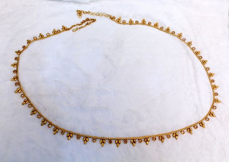 * Beautifully designed gold color belly chain. * can be used with belly dance costumes and saris. * Adjustable from 25 to 41 inches waist. * D.no.1 * D.no.2 *D.no.3 *D.no.4 Bollywood Gold Bridal Belt For Festivals, Gold Bollywood Bridal Belt For Party, Bollywood Style Gold Bridal Belt With Tilla, Gold Bridal Belt For Festive Occasion, Temple Jewelry Style, Gold Bridal Belt For Diwali Ceremonial, Gold Temple Jewelry Bridal Belt For Festive Occasion, Festive Gold Bridal Belt In Temple Jewelry Style, Festive Gold Bridal Belt With Tilla Detailing, Bohemian Gold Beads Waist Chain For Festivals