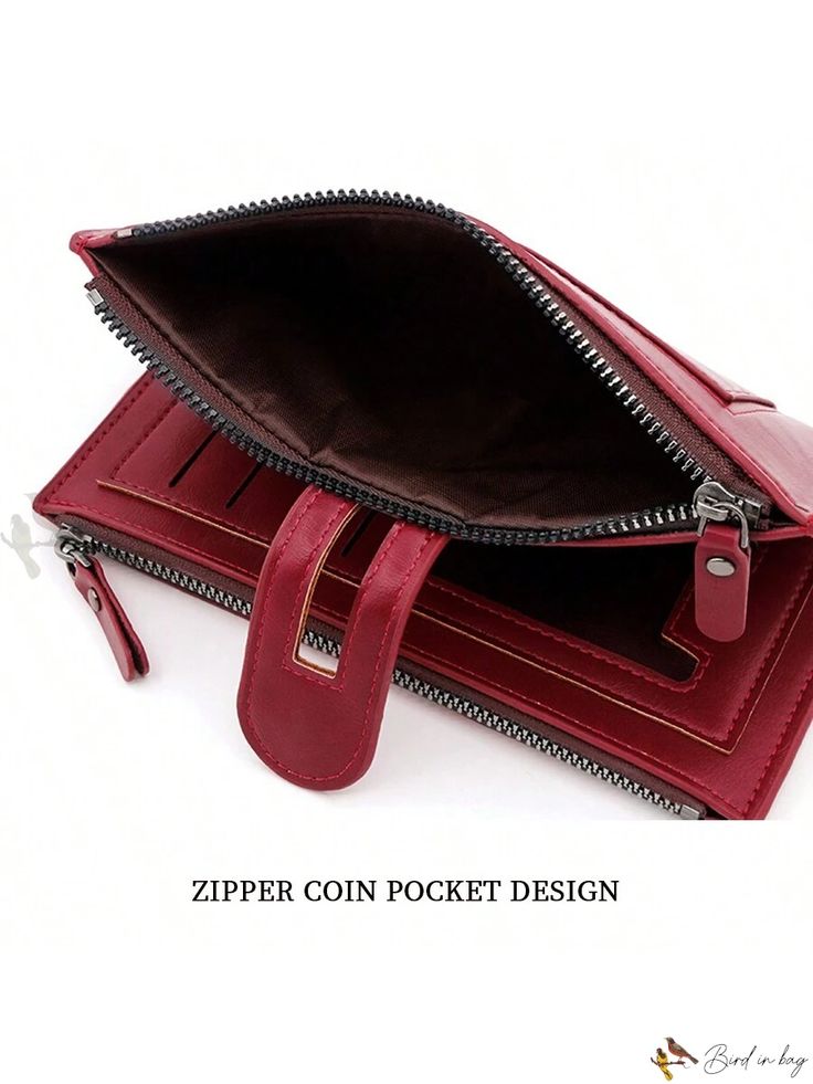 the zipper coin pocket design is made from red leather and has two zippers on each side