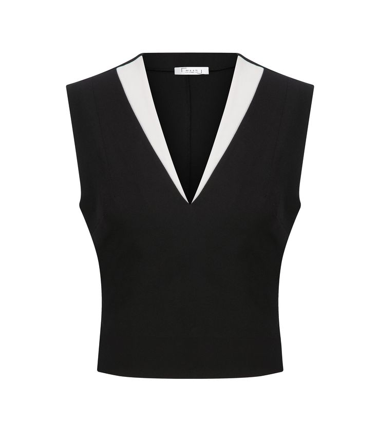 Introducing our elegant and stylish Deep V-neck Sleeveless Women Blouse, perfect for your business casual wardrobe. Crafted with precision, this black blouse features an elegant and flattering design that offers both comfort and sophistication. ✨ Benefits: 👗 Flattering V-neckline enhancing natural curves 🌟 Ideal for business casual and formal occasions 🕊️ Sleeveless design for unrestricted movement 💎 Versatile black color easily matches various outfits 💃 Effortless elegance for confident we Classic V-neck Office Vest, Elegant Formal V-neck Top, Fitted Sleeveless V-neck Top For Work, Modern Sleeveless Tops For Formal Occasions, Modern Sleeveless Formal Tops, Elegant Sleeveless V-neck Top For Work, Elegant V-neck Vest For Office Wear, Sleek V-neck Tops For Office, Elegant Office Tank Top