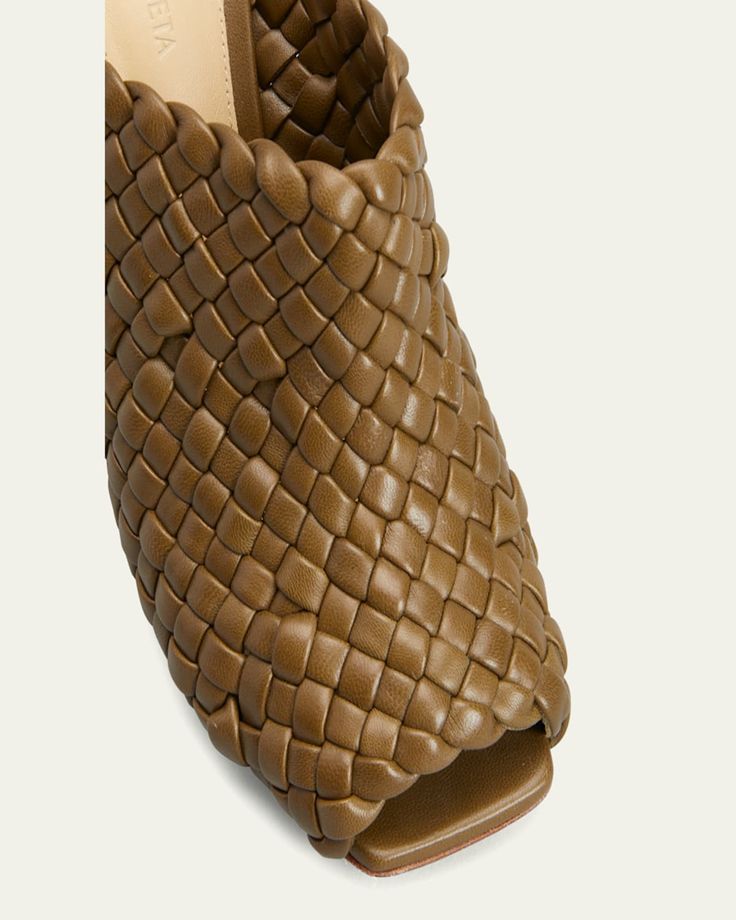 Bottega Veneta mule sandals in woven lambskin leather    4.00 in / 100 mm thick stiletto heel    Peep toe    Slide style    Leather/Rubber outsole    Made in Italy Chic Woven Leather Mules With Round Toe, Leather Heels With Intrecciato Weave And Open Heel, Leather Open Toe Heels With Intrecciato Weave, Elegant Woven Leather Open Toe Mules, Open Toe Woven Leather Heels, Luxury Brown Woven Leather Heels, Leather Mules With Woven Sole And Block Heel, Designer Leather Heels With Intrecciato Weave, Woven Leather High Heels