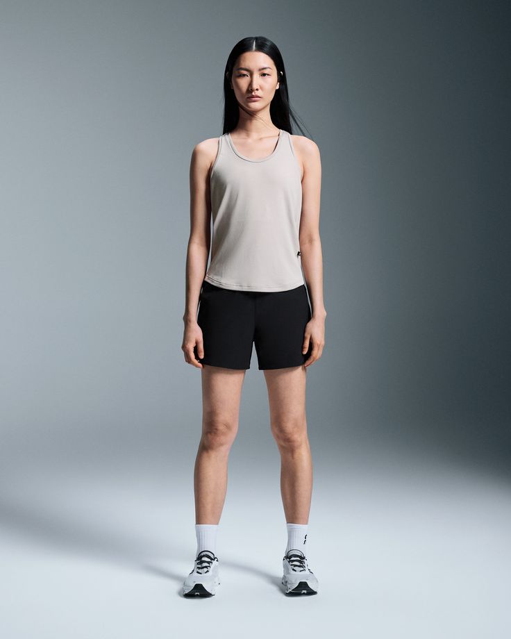 From park runs to practicing your yoga inversions, this performance-ready tank top is for working out (and chilling out). Soft, lightweight and never clingy, the Focus Tank helps you feel your best whatever your workout. For sessions that call for a wide range of motion and flexibility, this smart tank delivers the goods. Feel-good and quick-drying fabric keeps your mind focused on your workout – without thinking twice about sweat. This is our sleeveless super power. Our sweat-wicking secret to Racerback Activewear With Built-in Shorts For Training, Versatile Compressive Moisture-wicking Tank Top, Compressive Racerback Activewear For Light Exercise, Versatile Go-dry Activewear For Light Exercise, Yoga Activewear Tank With Light Support, Casual Compressive Top With Mesh Back, Medium Support Tank Top For Yoga, Sportswear Tank Top With Moisture-wicking, Compressive Tank Activewear For Light Exercise