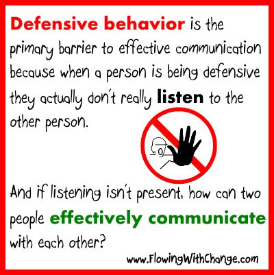 a red sign that says defensive behavior is the primary barrier to effective communication