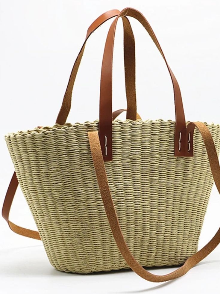 Casual style. Lightweight. Straw. Raffia natural fiber. Measurements are 40 cms. Length (15.74” inches) x 24cms height (9.4” inches). Color may be lighter or darker depending of the device it is displayed. Light Brown Tote Beach Bag For Vacation, Light Brown Tote Bucket Bag With Braided Handles, Light Brown Bucket Bag With Braided Handles, Double Handle Straw Shopping Bag, Chic Light Brown Bucket Straw Bag, Beige Straw Bag With Leather Handles, Straw Bucket Shoulder Bag With Handles, Light Brown Straw Bag With Leather Handles For Travel, Rectangular Beige Straw Bag With Handles