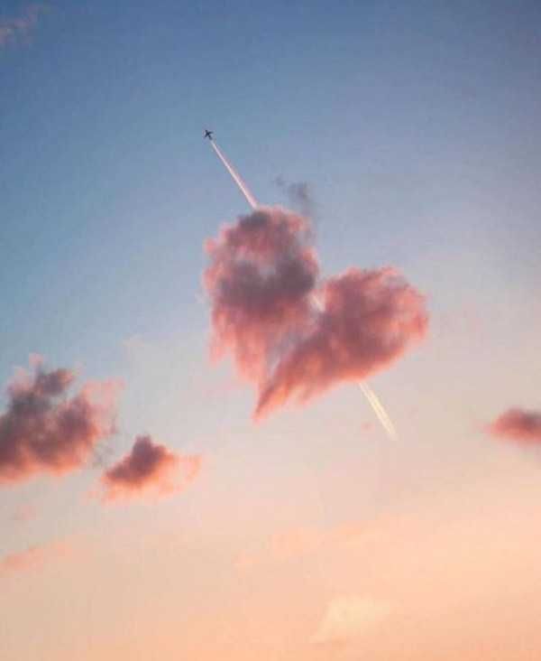 an airplane flying in the sky with a quote above it that says, my hart wants only you