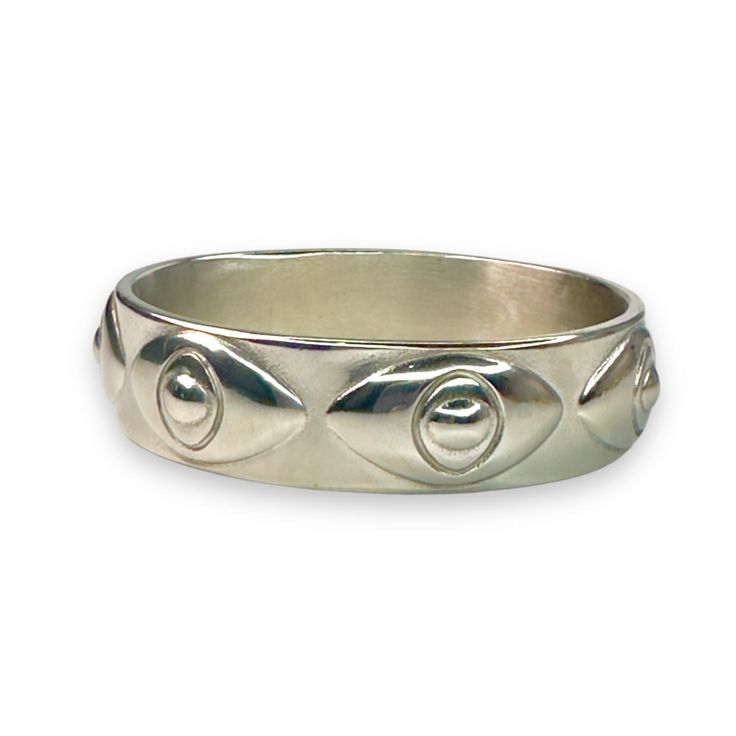 Introducing the Heleana Bangle, a stunning piece designed to protect and enchant. Crafted from durable stainless steel and available with luxurious gold plating, this bangle features an eternity style adorned with intricately detailed evil eyes all around. Each eye symbolizes protection and foresight, inspired by Heleana, the legendary character in "House Of The Dragon" known for her ability to see into the future. Perfect for adding a touch of mystique and elegance to any outfit, the Heleana Ba Adjustable Stackable White Gold Bangle, White Gold Stainless Steel Bangle Cuff Bracelet, White Gold Stainless Steel Cuff Bangle, White Gold Stainless Steel Cuff Bracelet, White Gold Stainless Steel Bangle, Modern Adjustable Round Bands, Metal Bangle For Promise, Metal Bangle For Promise Occasion, Modern Metal Bracelets For Anniversary