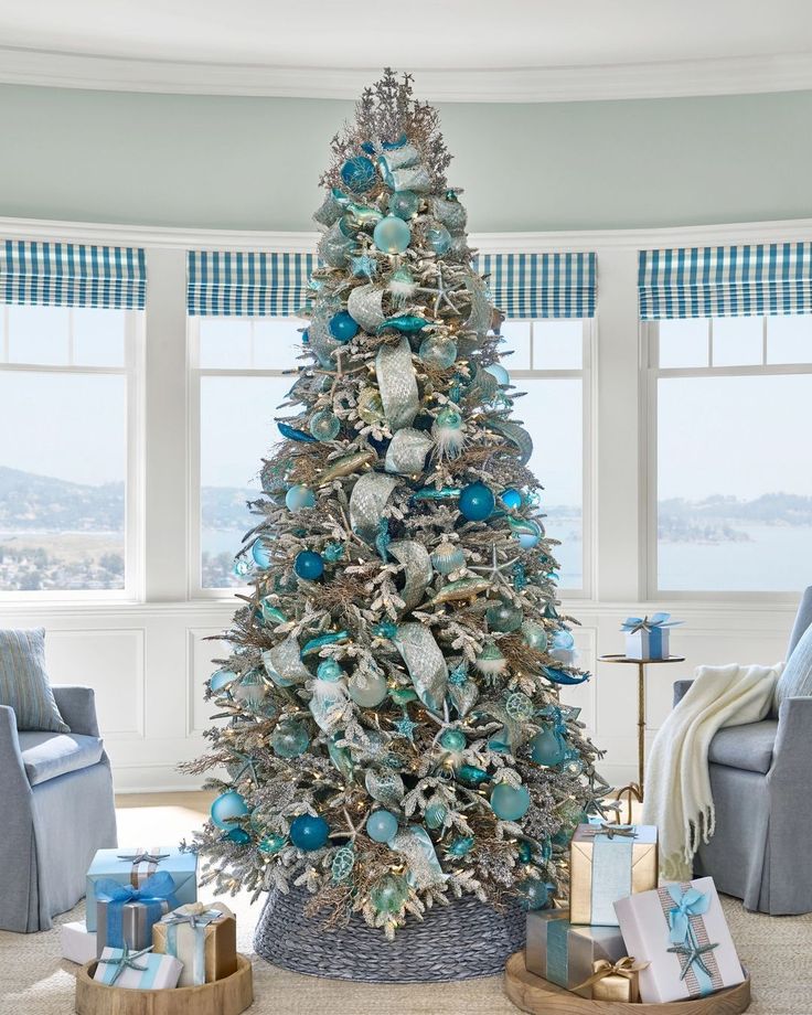 ⁣⁣In celebration of #1989TaylorsVersion coming out, we thought our fellow Swifties would love to save this as an inspo to create a 1989 TV-inspired Christmas tree with our Coastal Chic ornament set 💙🤍 Beachy Christmas Decor, Beachy Christmas Tree, Teal Christmas Tree, Beach Christmas Trees, Teal Christmas, Coastal Christmas Tree, Turquoise Christmas, Florida Christmas, Blue Christmas Decor