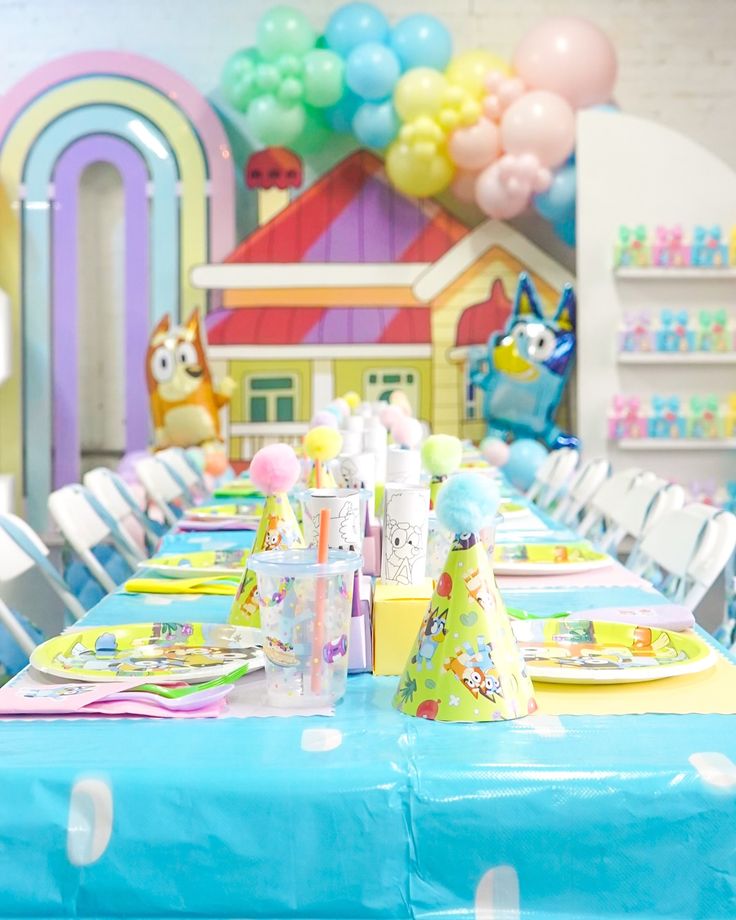 a party table set up for a children's birthday