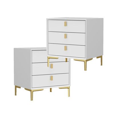 two white drawers with gold handles on each side and one drawer closed to the other