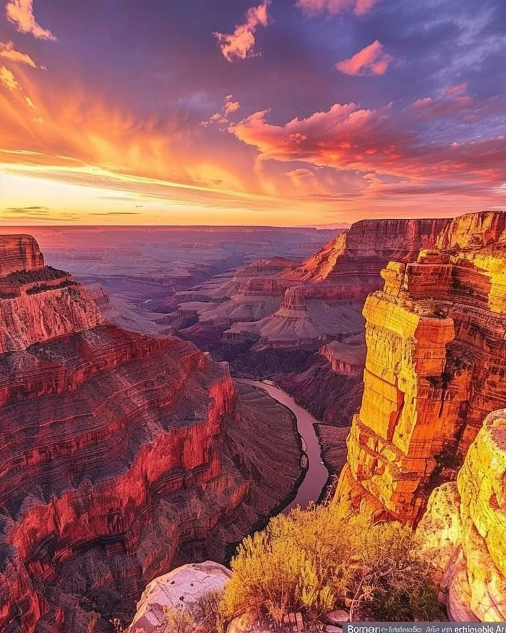 the sun is setting over the canyons and cliffs in this beautiful scene with clouds