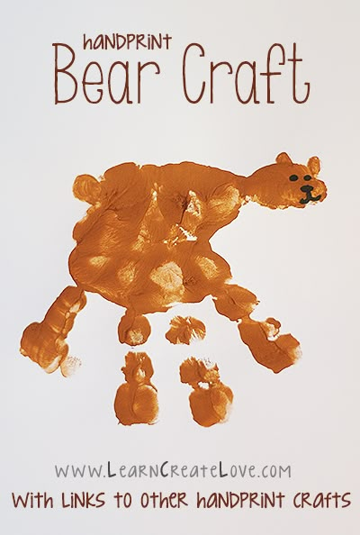 the bear craft is made with handprints