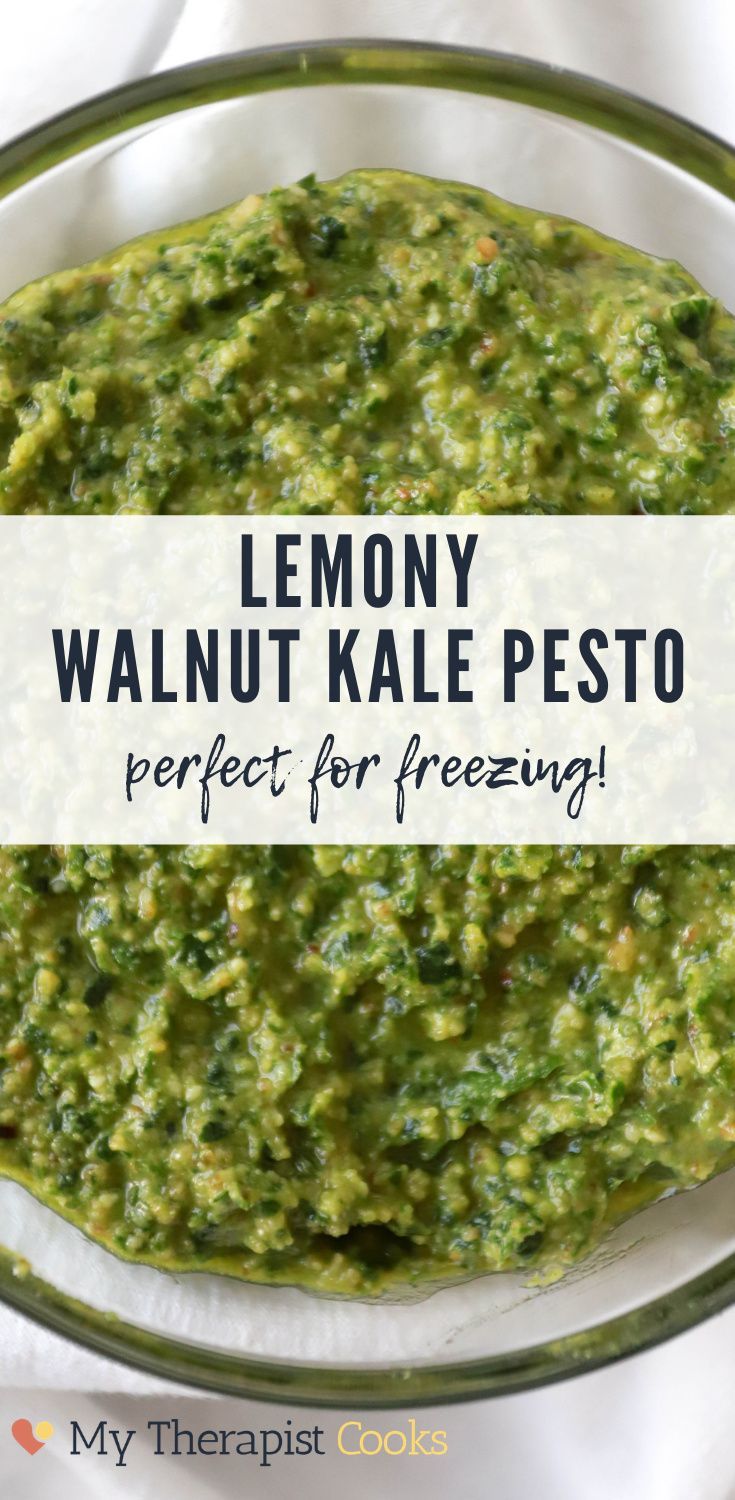 a bowl of lemony walnut kale pesto on a white tablecloth with text overlay