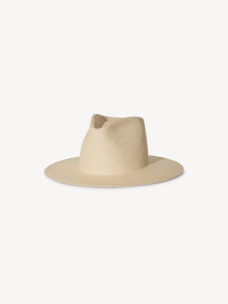 Details Greta is meticulously crafted from natural-toned Panama straw into a structured silhouette with a flat brim, conjoining sophistication and craftsmanship to create the ultimate straw staple. · Brim: 3.5"· Crown: 4.75"· Structured Panama Straw Fit Runs true to size. If between sizes, we suggest sizing up.