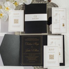 the wedding stationery is laid out on top of each other, including black and white cards