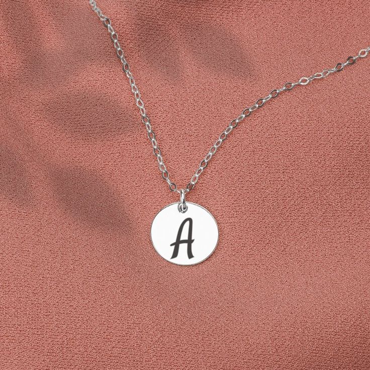 The Custom Initial Disc Necklace is the perfect way to show off your unique style and personality. This beautiful, personalized necklace offers you the opportunity to create something absolutely unique and meaningful! Choose from one to six discs crafted from our three different metal choices: silver, gold, and rose gold. Each disc can be custom engraved with an initial of your choice, or select any symbol from our curated list. The necklace also comes in three different lengths so you can find Initial Disc Necklace, Custom Initials, Disc Necklace, Personalized Necklace, Custom Engraving, The Necklace, Gold Filled, Silver Gold, Show Off