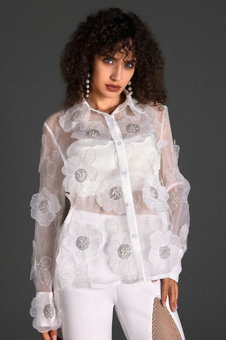 Step into a world of style with our organza embroider floral shirt. This shirt boasts intricate floral embroidery on delicate organza fabric, exuding modern elegance and charm. The addition of transparent elements adds a subtle allure, ensuring you radiate charm and confidence at every event. Handmade customization Fabric composition: 90% polyester fiber, 10% spandex Washing method: hand wash or dry clean Popular elements: organza Simple Tank Tops, Transparent Top, Sweatshirt Jean Jacket, Women Cargo Pants, Organza Fabric, Women Cargos, High End Fashion, Floral Shirt, Modern Elegance