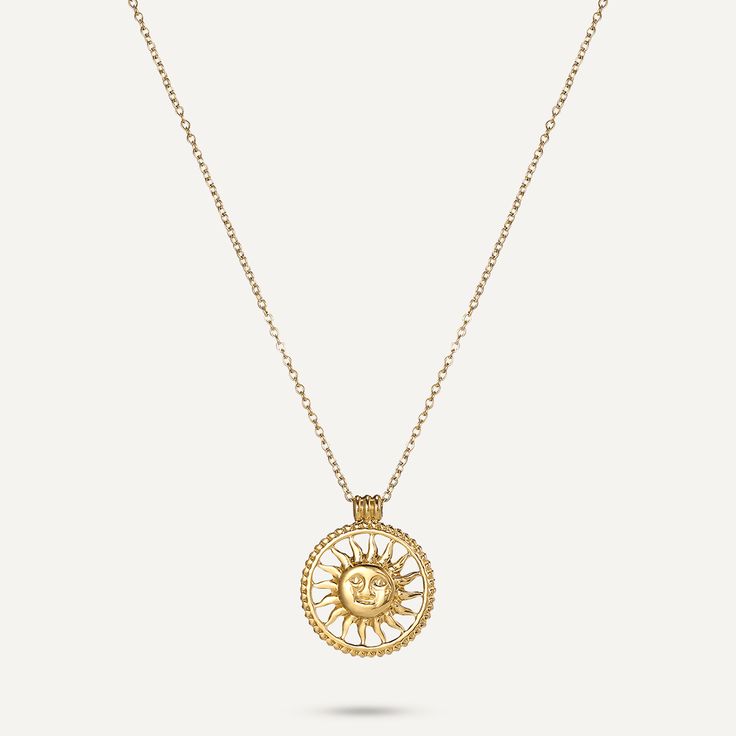 This captivating piece features a beautifully detailed sun pendant, radiating warmth and positive energy. Crafted from 18K gold-plated stainless steel, the necklace combines a vintage-inspired design with a modern twist, making it perfect for everyday wear or special occasions. Adjustable for a comfortable fit, the Radiant Sol Necklace is a symbol of light, energy, and joy, bringing a touch of sunshine to your jewelry collection. Product Code: DN2714K Collection: Vibes Type: Clasp Material: 18K Gold-Plated Stainless Steel Dimensions: Length 40-44cm Pendant Dimensions: Style: Vintage, Modern Includes: Spiritual Yellow Gold Jewelry With Sun Design, Symbolic Yellow Gold Necklaces With Sun And Moon Design, Gold Medallion Necklace With Sun Design, Yellow Gold Sun And Moon Pendant Necklace, Yellow Gold Medallion Necklace With Sun Design, Yellow Gold Brass Jewelry With Sun Design, Gold Spiritual Necklace With Sun Design, Spiritual Gold Necklace With Sun Design, Bohemian Yellow Gold Jewelry With Sun Design