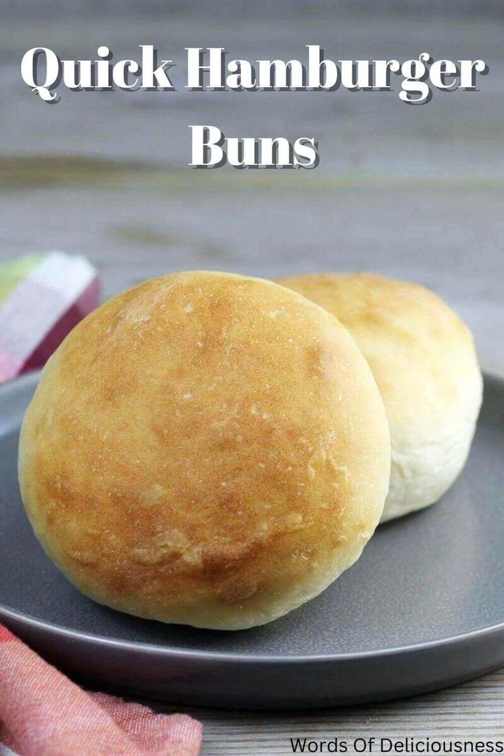 two hamburger buns on a plate with the words quick hamburger buns