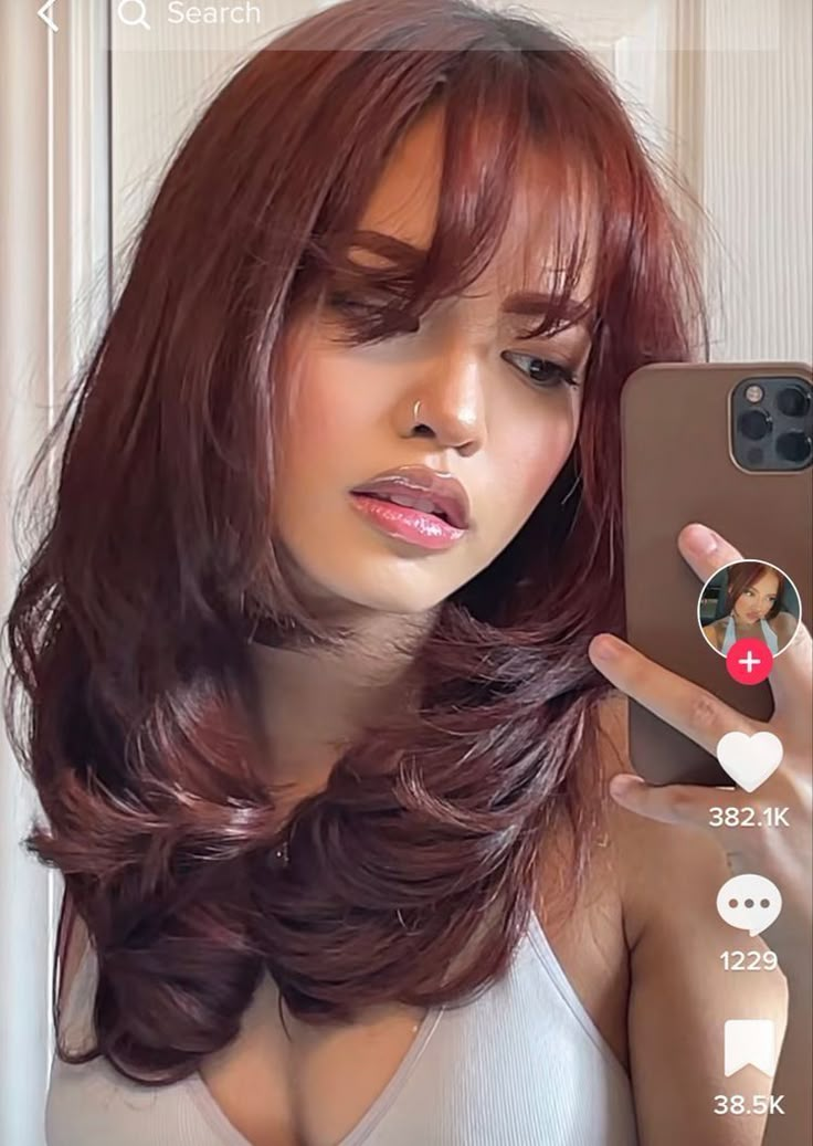 Reddish Burgundy Hair, Pameluhrose Hair, Villain Era Hair, Copper Balayage Curtain Bangs, Curtain Haircut Women, Layered Burgundy Hair, Hot Hair Colors For 2023, Dark Pink Brown Hair, Wine Red Hair On Brown Skin