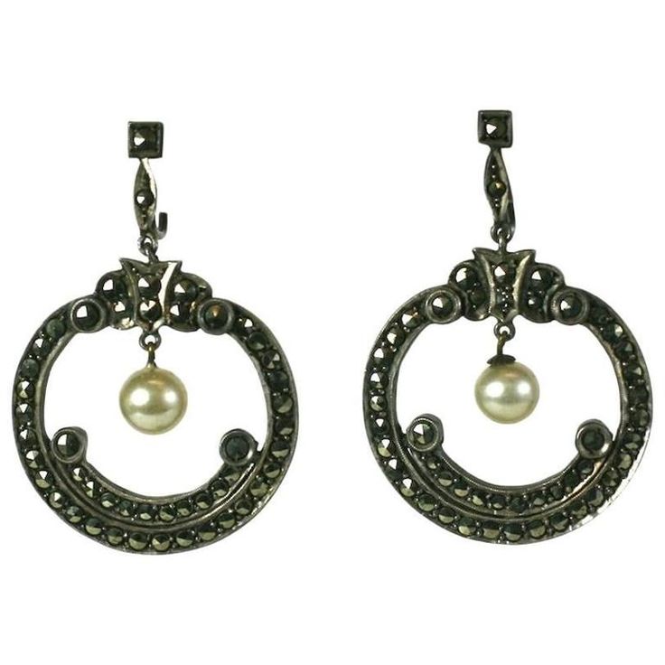 Art Deco Marcasite Hoop Earrings in an unusual configuration. Most Art Deco earrings are elongated but these are more unusual. Set in sterling with tight marcasite stone work, glass pearls and screw back fittings. 1930's USA. Excellent condition. 1.75" long x 1.2" wide. Art Deco Drop Earrings, Black Dangle Earrings, Marcasite Earrings, Horn Earrings, Marcasite Jewelry, Deco Earrings, Unusual Earrings, Dangle Hoop Earrings, Long Dangle Earrings