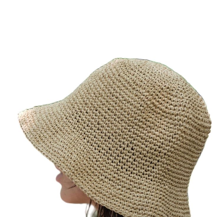 This hat is 100% handmade and crafted from raffia yarn. Raffia yarn is a natural and durable material, ensuring the hat's longevity. The wide brim of the hat is perfect for sun protection and offers a stylish look. This beige hat stands out with its simple and elegant design. It is an excellent accessory for both everyday use and outdoor activities like the beach. Its comfortable and lightweight structure ensures easy and prolonged wear. Raffia. You can store this hat, knitted from raffia rope, in a breathable cloth bag, protect it from fire and heat, and wipe the stains with a clean damp cloth. Lightweight Structure, Beige Hat, Raffia Hat, July Birthstone Jewelry, August Birthstone Jewelry, Hat Stands, Zodiac Jewelry, Cloth Bag, Gifts For New Mums