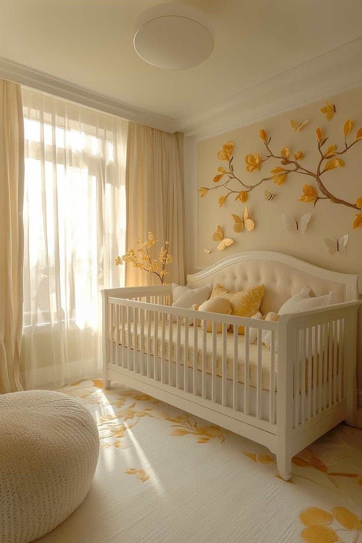 a baby's room with a white crib and yellow flowers on the wall