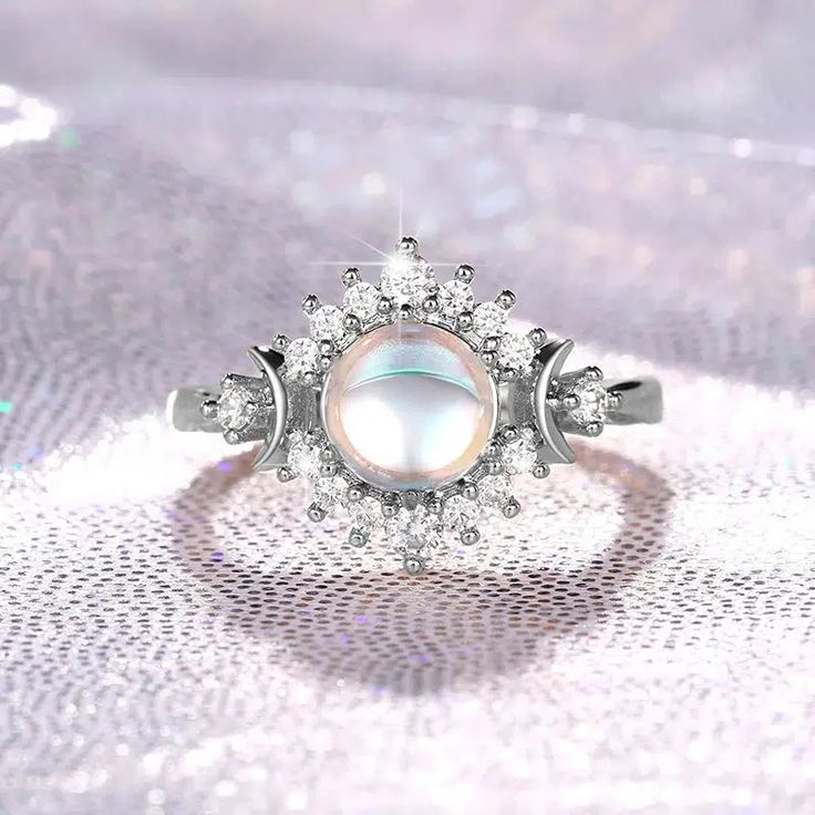 Elevate Your Ritual with Our Enchanting Opal Triple Moon Ring 🌙✨ Embrace the captivating power of the moon phases with our mesmerizing Opal Triple Moon Ring, a stunning piece of Wicca jewelry that celebrates the divine feminine. Crafted with stunning opal, this ring features the iconic triple goddess symbol, representing the Maiden, Mother, and Crone – the three phases of the lunar cycle. Whether you're a devotee of the Wiccan tradition, a practitioner of the magickal arts, or simply captivated by the allure of the moon, this Moon phases ring is the perfect accessory to adorn your ritual space and enhance your spiritual connection. The opal's iridescent shimmer and the intricate triple moon design make this ring a truly enchanting addition to your witchy jewelry collection. Elevate your m Funny Rings, Triple Goddess Symbol, Rings 2023, Witchcraft Jewelry, Maiden Mother And Crone, Witch Ring, Female Rings, Goddess Ring, Moon Phase Jewelry