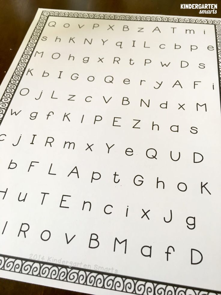 a close up of a sheet of paper with letters and numbers on it, sitting on top of a table