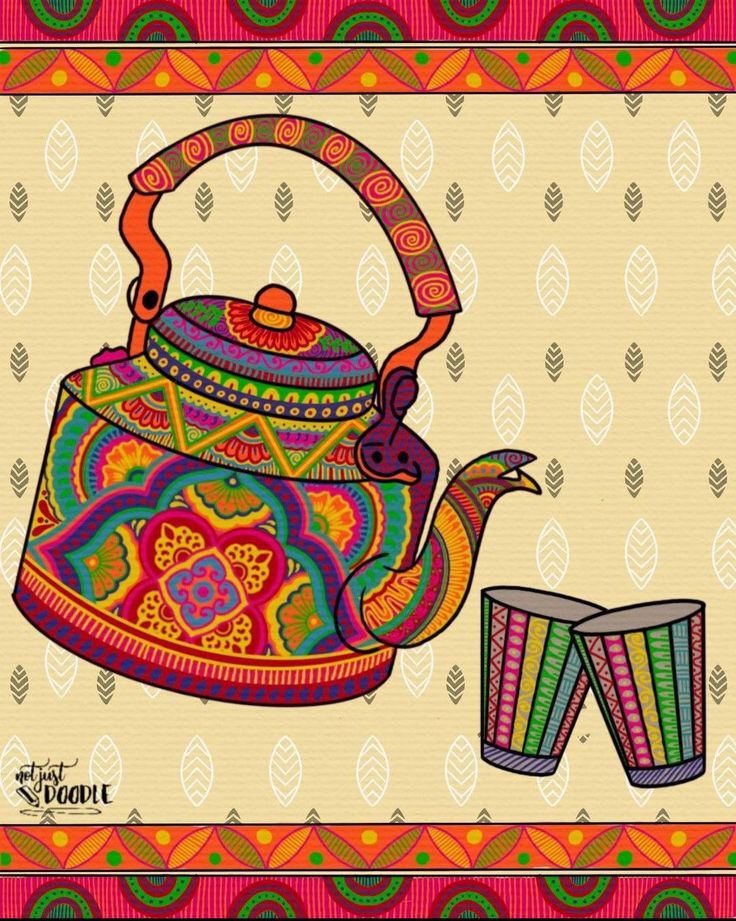 a colorful teapot and two cups on a table