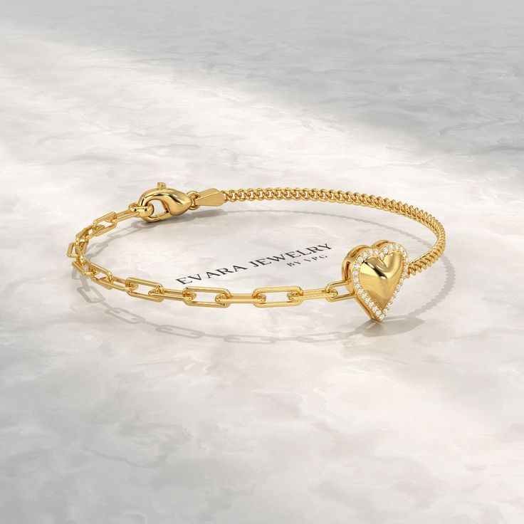 Introducing our exquisite Dainty Diamond Heart Paperclip & Cuban 50-50 Bracelet. Crafted from gleaming 10K, 14K, or 18K gold, this bracelet embodies elegance and durability. Its intricate paperclip design, adorned with a sparkling diamond heart, adds a touch of shimmer to your everyday look. Perfect for minimalist jewelry enthusiasts, this bracelet can be personalized with an engraved message, making it a cherished keepsake. Its versatile style complements both casual and formal attire, making i Elegant Heart Shaped Chain Bracelet For Anniversary, Elegant Heart-shaped Chain Bracelet For Anniversary, Elegant Gold Plated Heart Bracelet For Valentine's Day, Elegant Heart-shaped Anniversary Chain Bracelet, Yellow Gold Heart Chain Bracelet For Anniversary, Yellow Gold Bracelets For Anniversary On Valentine's Day, Classic Gold Bracelets For Valentine's Day, Elegant Gold Chain Bracelet For Valentine's Day, Elegant Gold Heart Bracelet For Anniversary