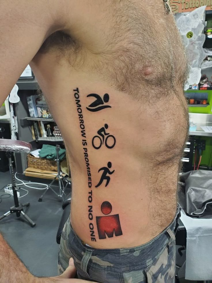 Ironman Triathlon Tattoo Ironman Tattoos Triathlon, Ironman Tri Tattoo, Iron Man Tattoo Triathlon, Triathlon Tattoo Men, Ironman 70.3 Tattoo, Ironman Tattoo Triathlon, Iron Man Tattoo Ideas, Marathon Tattoo Ideas, Man Tattoo Ideas