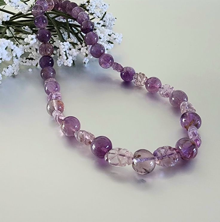 "NATURAL AMETHYST BEADS NECKLACE: Stone - Natural Amethyst Necklace Size - 18.5 inch with clasp Birthstone - Feb Birthstone Type - 100% Natural Closure - Box Clip Quality - Top Grade Quality Make - Handmade Package Shipping Service - Shipping across USA ABOUT AMETHYST/SIGNIFICANCE -  The ancient Greeks linked amethyst with the wine deity Dionysus due to its color and believed that it had the power to prevent drunkenness, with the term \"amethystos\" meaning \"not drunk\" in ancient Greek. Amethyst was also believed to help the wearer stay mentally clear and sharp, with renowned artist and inventor Leonardo da Vinci stating that it enhances intelligence and guards against negative thoughts. Amethyst has been linked with meditation enhancement in Buddhist traditions, and it's frequently used Amethyst Necklace With 108 Beads For Gifts, Feb Birthstone, Purple Amethyst Crystal Necklaces With Faceted Beads, Faceted Amethyst Beaded Necklaces, Purple Amethyst Crystal Necklace With Faceted Beads, Polished Amethyst Beaded Necklace, Tibetan Prayer Beads, Physical Beauty, Buddhist Traditions