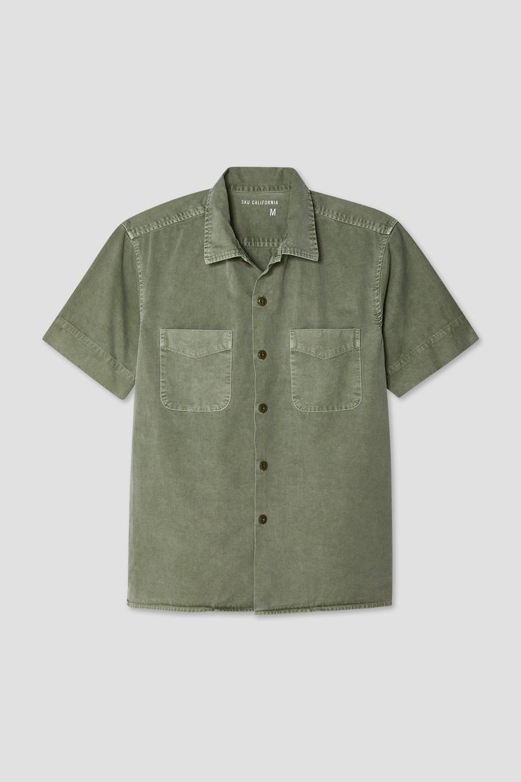 This full-cut, short-sleeved camp shirt has a convertible camp collar that can be worn open or buttoned. This silhouette has a straight hem and side vents that's intended to be worn untucked over shorts or chinos. -100% Cotton poplin-Garment Dyed and Preshrunk-Our Full Fit-Convertible Camp Collar-Double Chest Front Pockets-Double Pleats at Back Yoke-Straight Hem-Short Sleeves Made in USA of Imported Fabric Camp Shirt, Tee Shirt Dress, Camping Outfits, Lounge Shorts, Sweater Pants, Camping Shirt, Cotton Poplin, Black Shirt, Lookbook