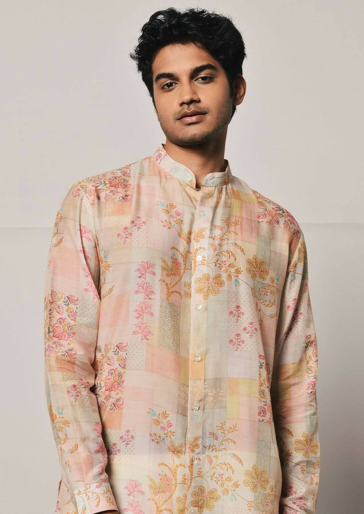 Patchwork print shirt style mal cotton kurta featuring a mandarin collar, cuffed sleeves and a curved hemline. This is a 2 piece set complete with a cream trouser style cotton pajama. Traditional Spring Kurta With Set-in Sleeves, Spring Cotton Silk Kurta With Printed Motifs, Summer Cotton Kurta With Set-in Sleeves, Cotton Silk Straight Kurta With Set-in Sleeves, Cotton Silk Kurta With Set-in Sleeves, Spring Festive Kurta With Set-in Sleeves, Long Sleeve Multicolor Cotton Silk Kurta, Cotton Kurta With Set-in Sleeves For Eid, Festive Long Sleeve Cotton Lawn Suit