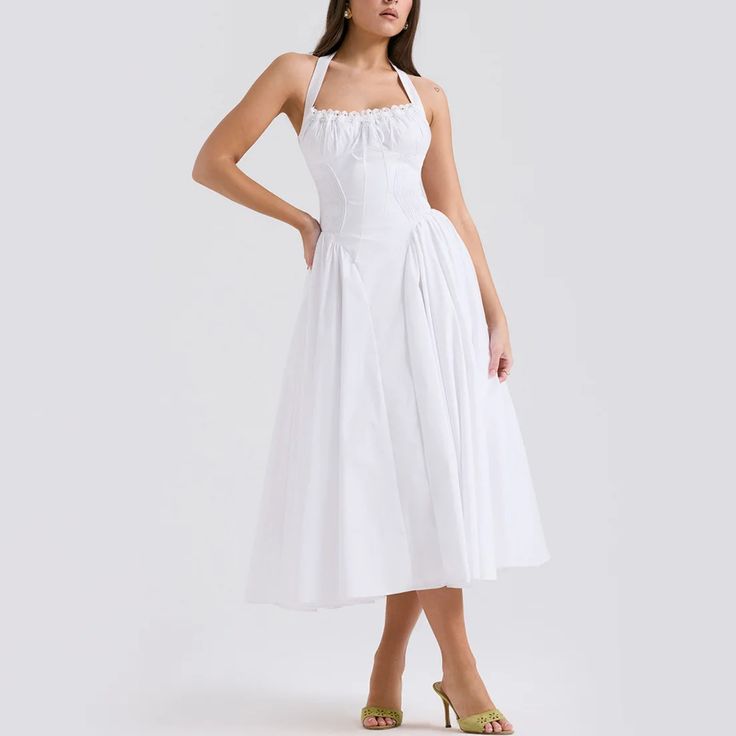 Embrace timeless beauty with this stunning A-line fit and flare midi dress. The halter neck provides a classic yet contemporary look, ideal for any fashionable wardrobe. Delicately crafted with pleated sides on the skirt, this dress combines elegance with a playful twist. Whether you’re attending a garden party, a cocktail event, or a dinner date, this dress is your go-to for effortless style and grace. Color: White, Pink, FloralSilhouette: Fit & FlareLength: MidiMaterial: PolyesterNeckline: Hal Chic A-line Tea Length Dress For Garden Party, Ruched A-line Midi Dress For Cocktail, Chic A-line Tea Length Summer Dress, A-line Midi Dress With Pleated Bodice For Date Night, Chic A-line Midi Dress For Garden Party, Chic A-line Tea Length Dress With Pleated Bodice, Classic A-line Midi Dress For Date Night, Fitted A-line Halter Sundress, Formal Sleeveless Midi Dress With Gathered Neckline