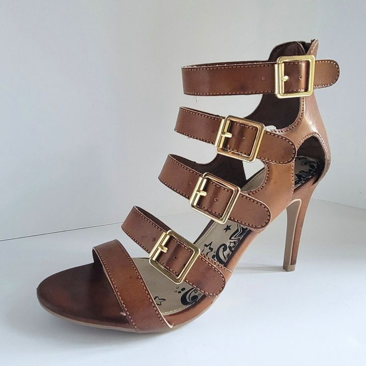 Brash Cognac Color Strapped Sandals. Gently Worn, Look Brand New And They Come In Original Box With Packing. Sandal Has Golden Buckles As Shown In The Images On The Outer Side Of Each. Heel Is 3 1/2 Inches. Brown Ankle Strap Heels With Strap Detail, Brown Ankle Strap Sandals With 4-inch Heel, Chic Brown Heels With Straps, Brown High Heel Sandals With 4-inch Heel, Brown Strappy Synthetic Sandals, Brown Strap Heels With Open Heel, Brown Heels With Strap And Open Heel, Brown Heels With Buckle Closure And Round Toe, Brown Open Heel Strappy Shoes