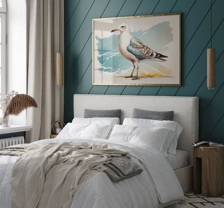 a seagull sitting on top of a white bed in a room with blue walls