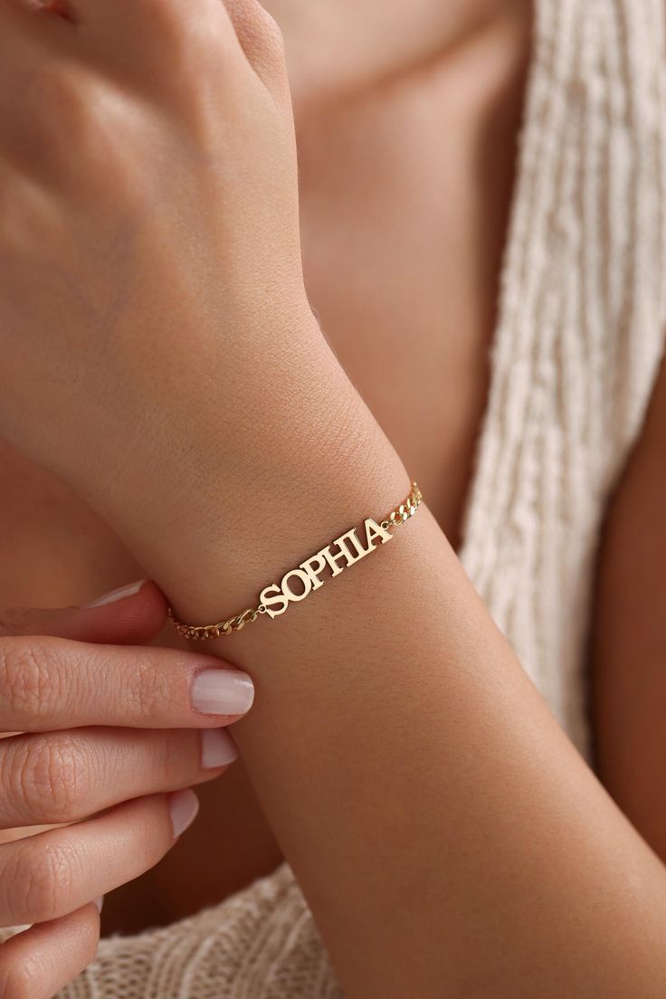 CUSTOM NAME BRACELET Elevate your style with our exquisite handmade custom name bracelet, crafted from premium 925 sterling silver. Available in stunning gold, silver, and rose gold finishes, this bracelet features your name in elegant capital letters, making it a truly personalized accessory. Fastened securely with a spring ring clasp and accompanied by an extension chain for easy adjustment, it's both practical and stylish. Perfect for a variety of occasions, from birthdays to weddings, this b Custom Bracelet, Capital Letters, Name Bracelet, Custom Bracelets, Heartfelt Gifts, Bracelet Gold, Adjustable Bracelet, Silver Rose Gold, Bracelet Gift